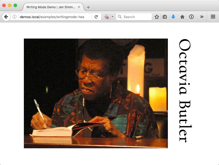 Man writing in a book with the text Octavia Butler down one side, to be read with your head tilted to the right.